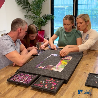 Family puzzle time with PuzzleDock's sorting drawers and protective cover